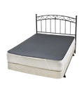 Queen bed with metal headboard with grey Earthing grounding mat underlay covering the top of the mattress.